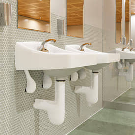 wall mounted bathroom sink with pipes covered in ADA coverings